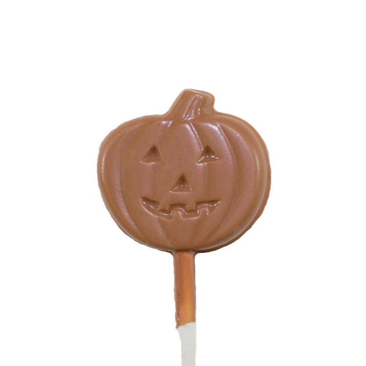 A chocolate lollipop with a pumpkin shape on a stick, designed for Halloween.