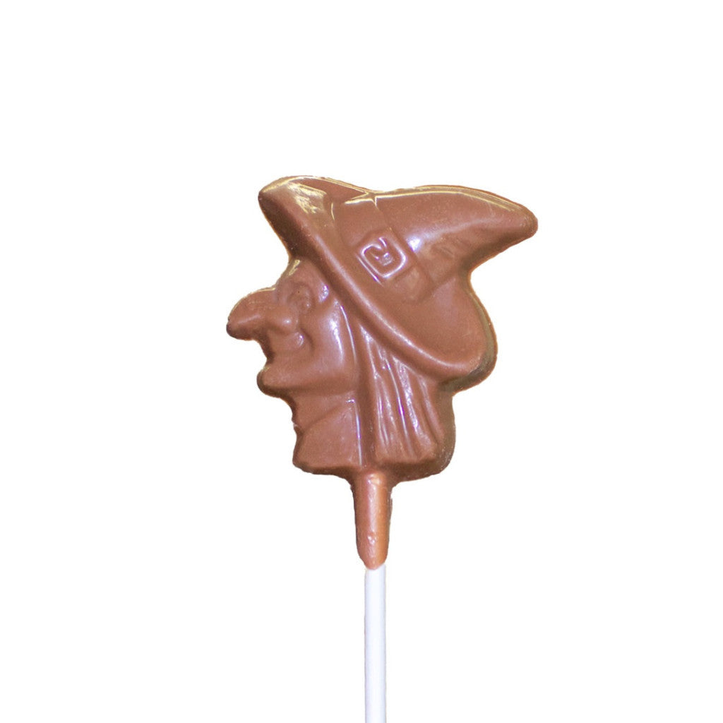 A chocolate lollipop with a design resembling a witch's head.