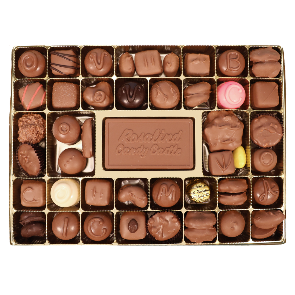 A top-down view of a 30-piece chocolate box from Rosalind Candy Castle featuring an assortment of milk and dark chocolates, pralines, and a pink and yellow candy, set against a plain white background.