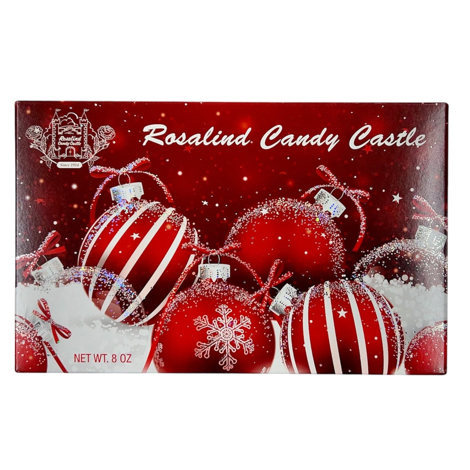Rosalind Candy Castle chocolate box with Christmas ornaments on a red background
